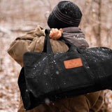 Tote Shape Canvas Firewood Log Carrier black lifestyle image outdoors
