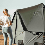 13 regatta bell tent boulder grey with woman standing in front of it