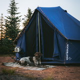 Regatta Bell Tent Sapphire Blue in forest with dog in front of it