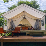 alpha wall tent canvas porch set up on a platform covering the alpha wall tent completely