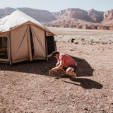 altimus bell tent being secured to the group for extra sturdiness