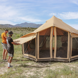 altimus bell tent's built in awning being open by two guys 