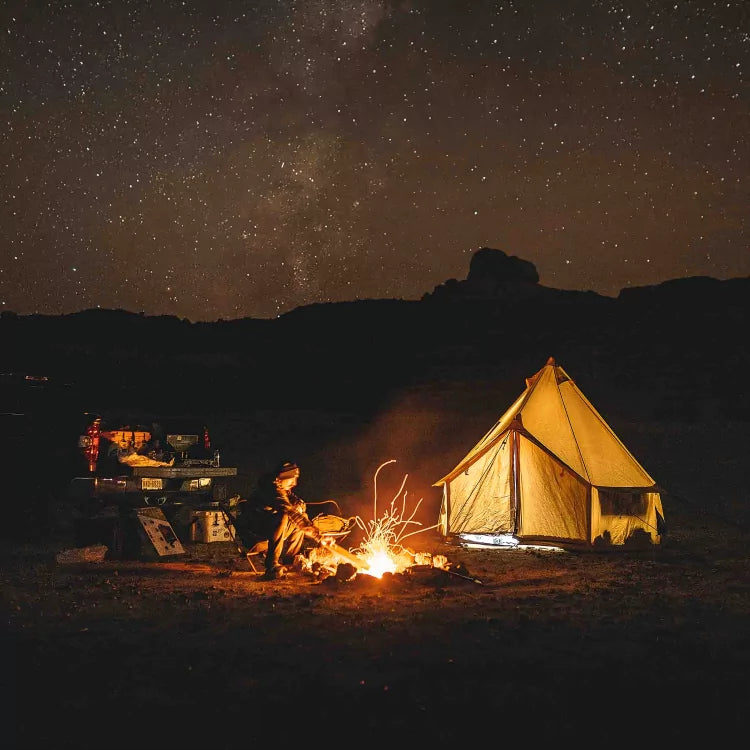 cozy bell tent setup under a starry sky