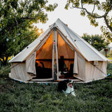 Spacious regatta bell tent open to a warm sunset