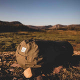 Hoplite Canvas Duffel Bag placed outdoors in the sunlight